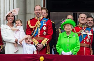 Catherine, Duchess of Cambridge, Princess Charlotte, Prince George, Prince William, Duke of Cambridge, Queen Elizabeth II and Prince Philip, Duke of Edinburgh stand on the balcony during the Trooping the Colour, this year marking the Queen's official 90th birthday at The Mall on June 11, 2016 in London, England