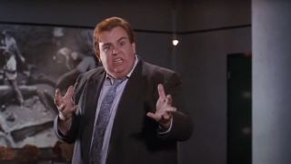 John Candy takes a martial arts pose in Who's Harry Crumb.