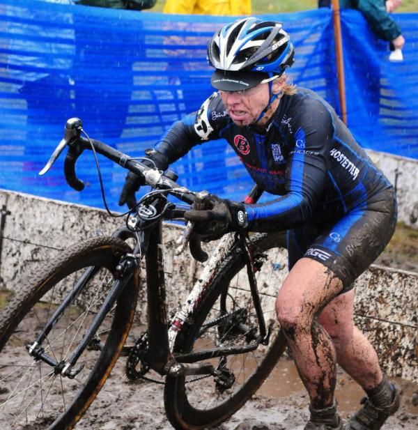 Laura Van Gider (C3 Athletes Serving Athletes) is surprising comfortable in mud