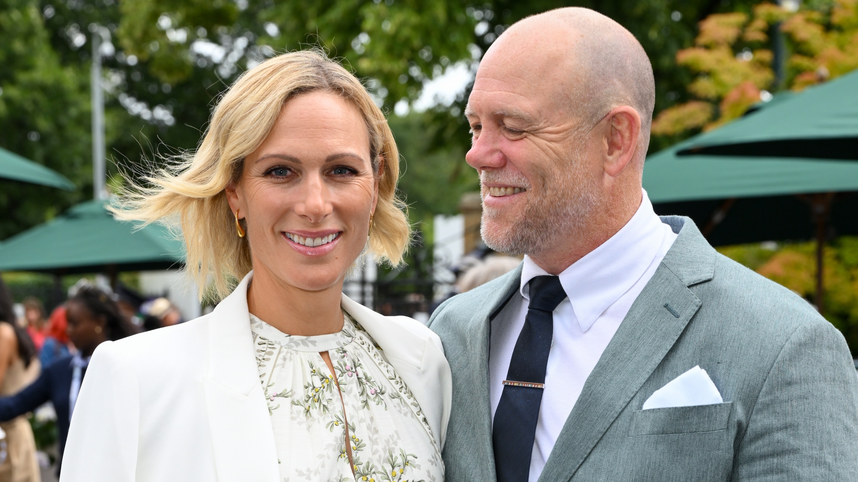 Zara Tindall and Mike Tindall smile as they attend day ten of the Wimbledon Tennis Championships at the All England Lawn Tennis and Croquet Club on July 10, 2024