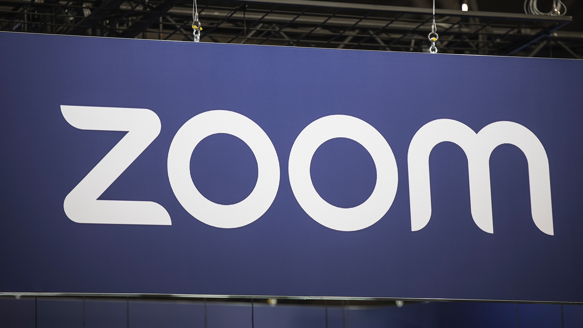 Zoom logo and branding at the Integrated Systems Europe (ISE) audiovisual and systems integration exhibition in Barcelona.