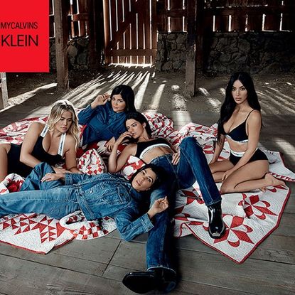 Kylie Jenner covers her stomach in family Calvin Klein underwear campaign