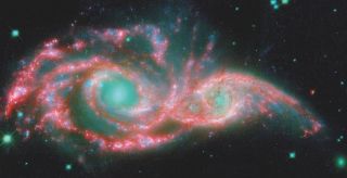 two galaxies merging