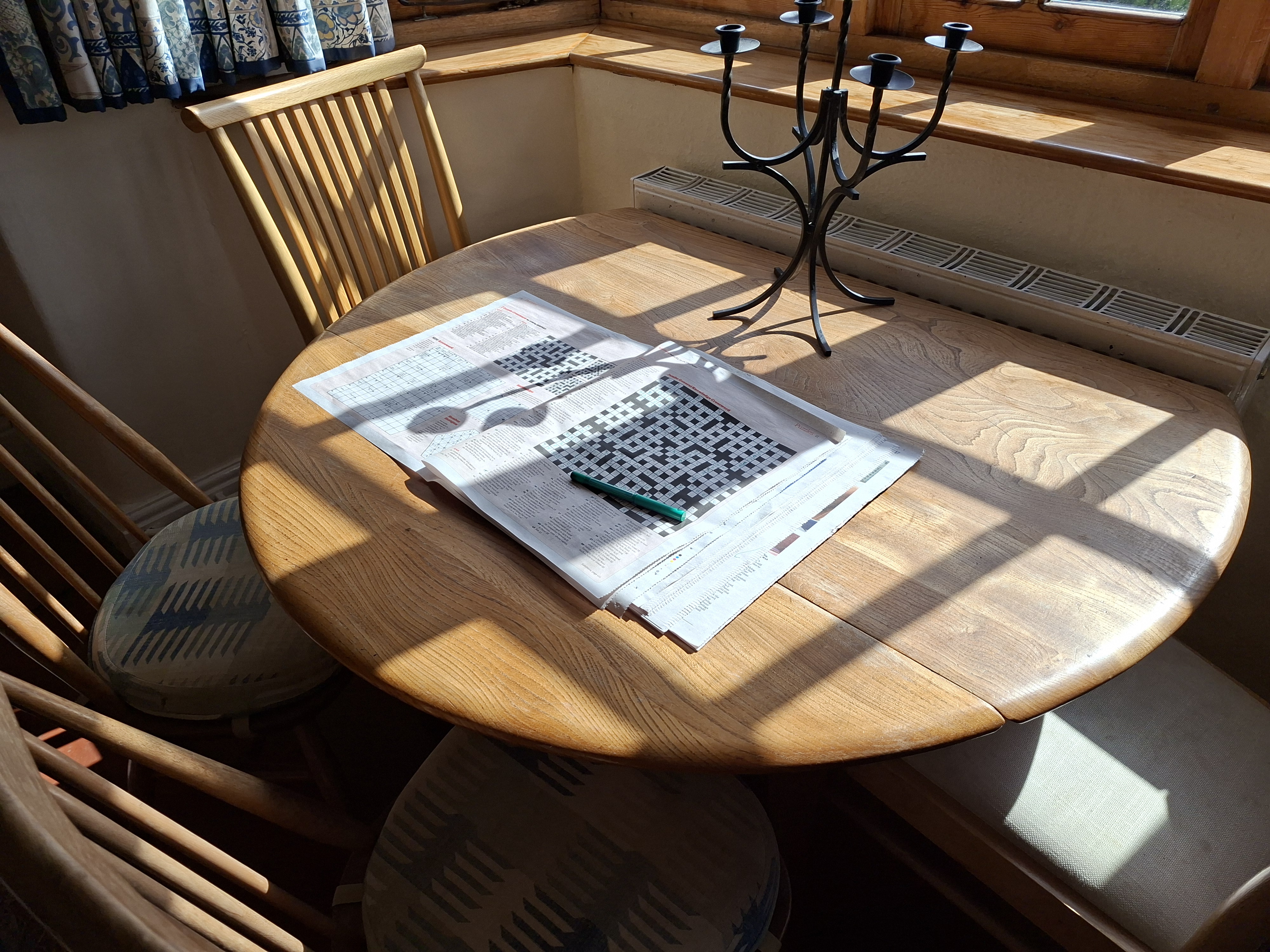 A photo taken on the Samsung Galaxy A57 showing a newspaper on a table.