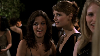 Summer and Marissa are gossiping at the fashion show in the pilot of The O.C.