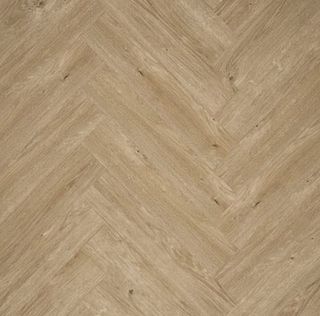 Light wooden herringbone flooring