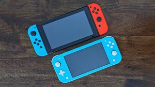 Nintendo Switch and Switch Lite on table.