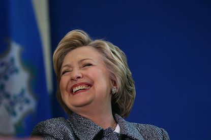 Hillary Clinton has a laugh.