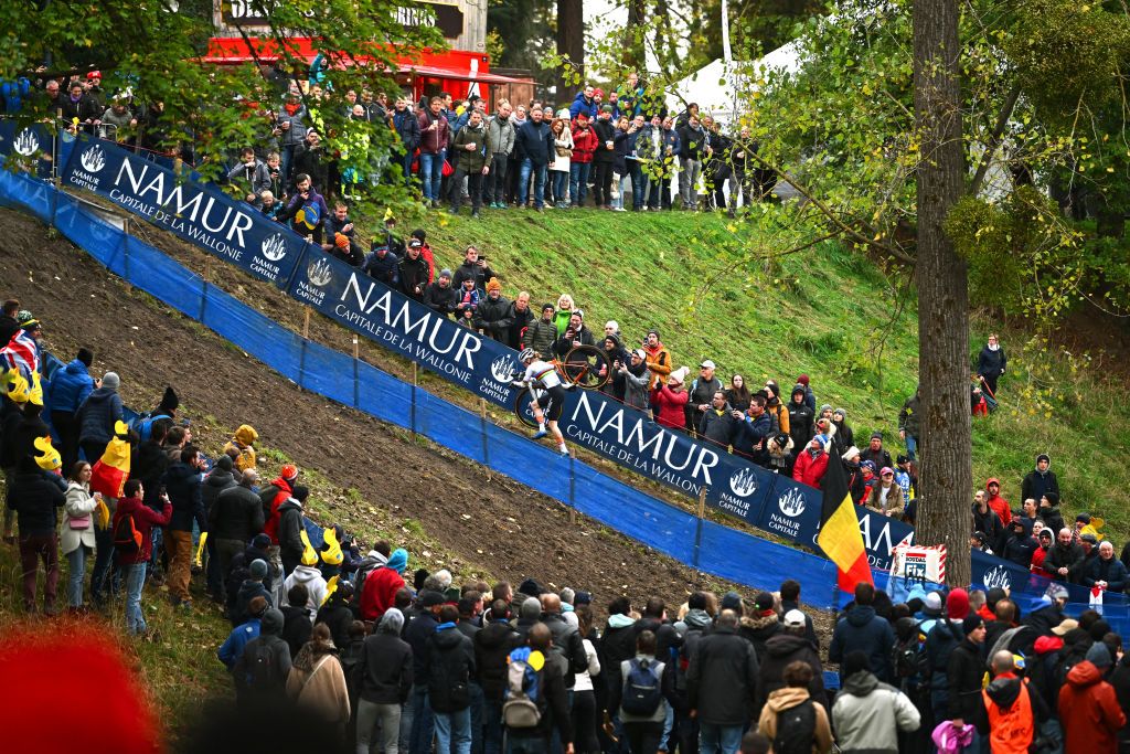 NAMUR BELGIUM NOVEMBER 06 Puck Pieterse of The Netherlands competes in the breakaway while fans cheer during the 20th UEC European Cyclocross Championships 2022 Womens U23 EuroCross22 on November 06 2022 in Namur Belgium Photo by Luc ClaessenGetty Images
