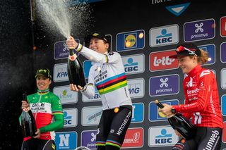 LtoR Second placed Italian cyclist Marta Bastianelli winner Dutch cyclist Annemiek van Vleuten and third place Dutch cyclist Floortje Mackaij spray champagne as they celebrate on the podium after the Womens Elite race of the 75th edition of the oneday cycling race Omloop Het Nieuwsblad 1261km from Merelbeke to Ninove on February 29 2020 Ninove Photo by KRISTOF VAN ACCOM BELGA AFP Belgium OUT Photo by KRISTOF VAN ACCOMBELGAAFP via Getty Images