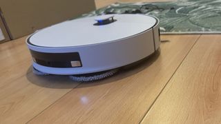 Samsung Jet Bot Combo AI robot vacuum cleaning a hard floor