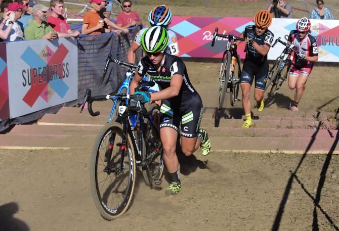 Kaitie Antonneau (Cannondale) running the stairs ahead of Erica Zevata, Crystal Anthony, and Mical Dyck