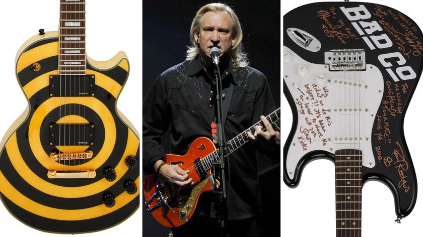 Joe Walsh plays his orange Duesenberg live onstage with the Eagles. On the left, his stage-played Zakk Wylde Epiphone Les Paul. On the right, a signed Bad Company Squier Strat. All three guitars just fetched huge sums at auction.