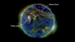 An EIT wave travels across the upper half of the sun on Aug. 1, 2010, as seen by SDO.