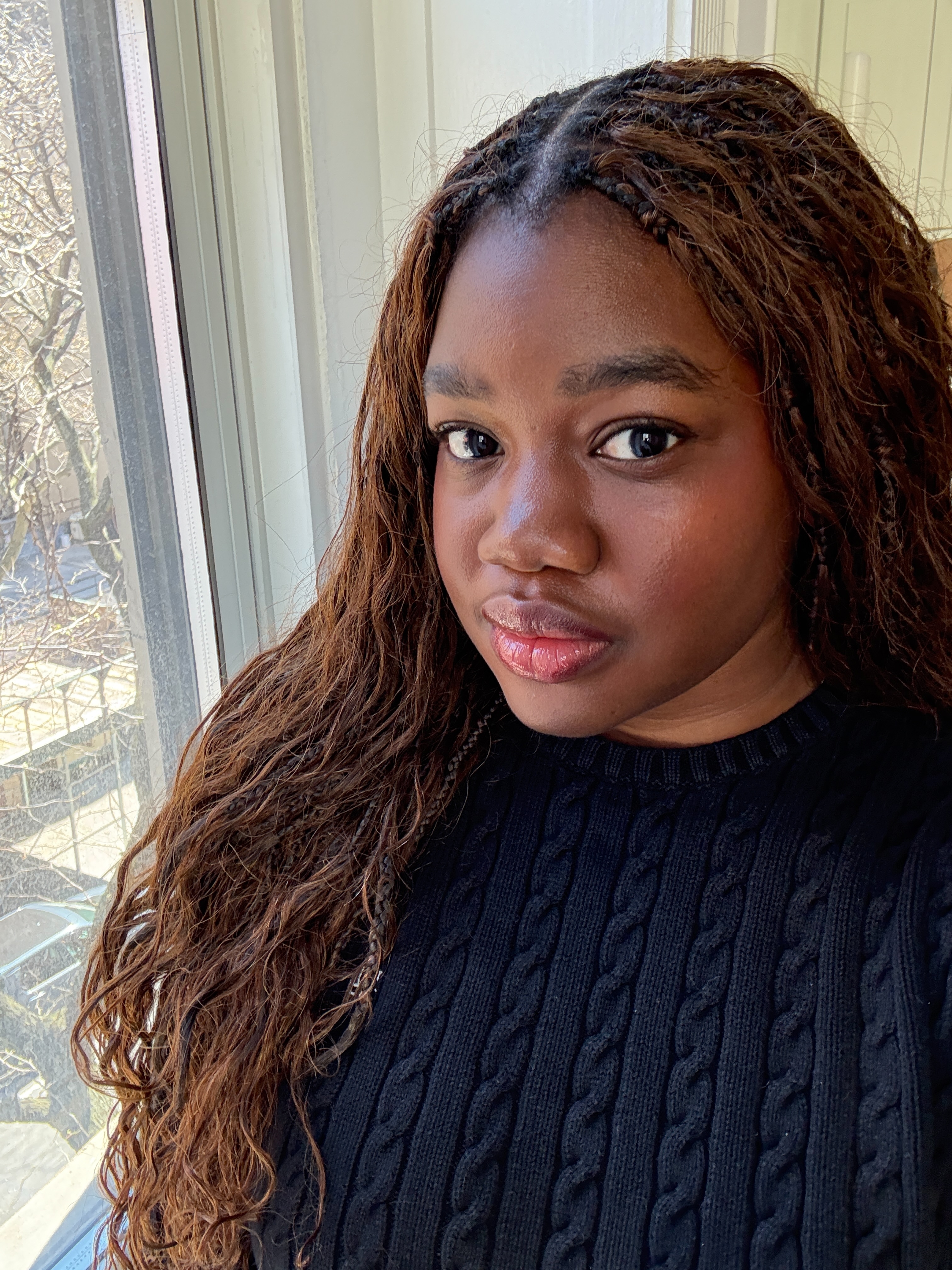 Associate Beauty Editor Maya Thomas wearing Lancôme's Définicils Defining & Lengthening Mascara