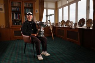 USA's Melanie Green poses with The Women's Amateur Championship trophy after her win in 2024