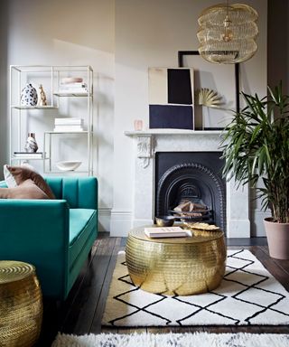 living room with fireplace, coffee table and berber-style rug