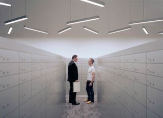 In Singapore, Tony Reynard (right) and Christian Pauli speak in one of the high-security vaults of the Singapore Freeport