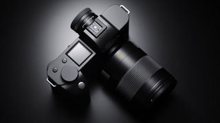 A top-down photo of the Leica SL2 full-frame camera showing its top plate and screen