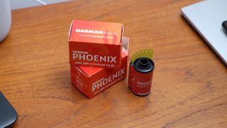 Harman Phoenix 35mm film canister next to its box