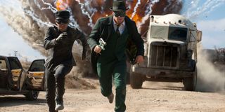 The Green Hornet Kato and The Green Hornet run away from an explosion