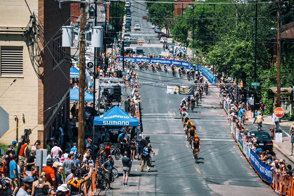 The peloton snakes through downtown Stillwater with Optum at the front. This was the scenario for most of the day.