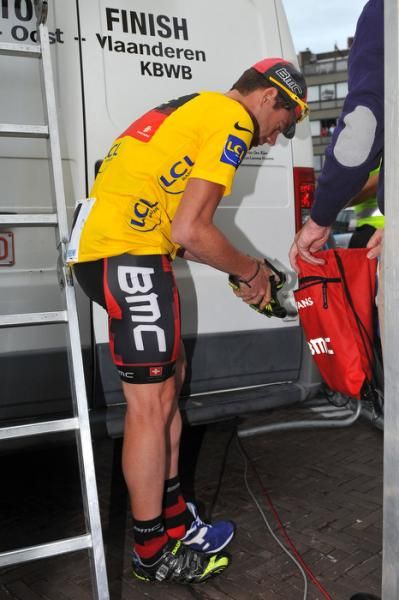 Evans puts on his work shoes.