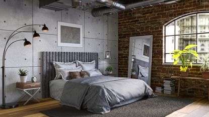 Grey painted bedroom with bed with white bedding and hanging wall art