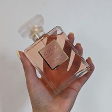 Hand holding Chanel Coco Mademoiselle Fragrance