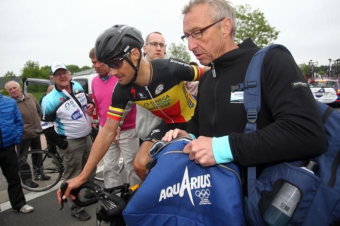 Boonen is helped to the podium