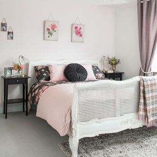 bedroom with grey flooring and double bed with bed side table