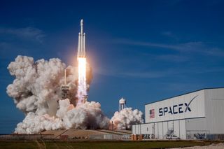 A Falcon Heavy rocket takes off from NASA's Kennedy Space Center on Feb. 6, 2018.