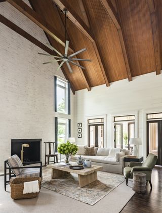 Image of living room with vaulted ceiling using wooden beams