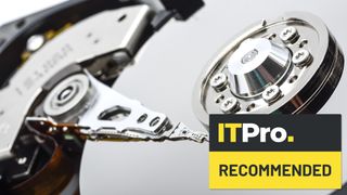 Picture of a hard drive platter and head with an 'IT Pro Recommended Award' logo superimposed in the bottom right hand corner