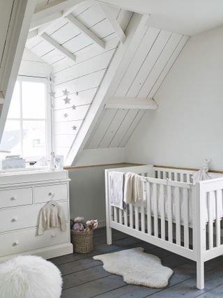 Classic cot bed, £399, Classic baby changing top, £99, Classic chest of drawers, £499, Sheepskin single rug, £95, Tibetan sheepskin stool, £295, Seagrass small oval company, £45, The White Company.