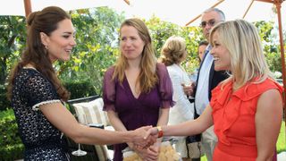 Catherine, Duchess of Cambridge meets actress Reese Witherspoon as she attends a reception to mark the Launch of Tusk Trust's US Patron's Circle on July 10, 2011 in Santa Barbara, California.