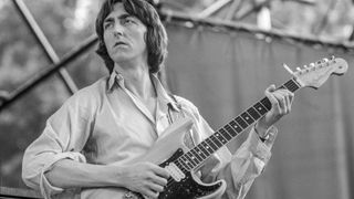 Allan Holdsworth performing with English progressive rock supergroup, U.K. in Central Park, New York City, 7th July 1978. The band are supporting Al DiMeola.