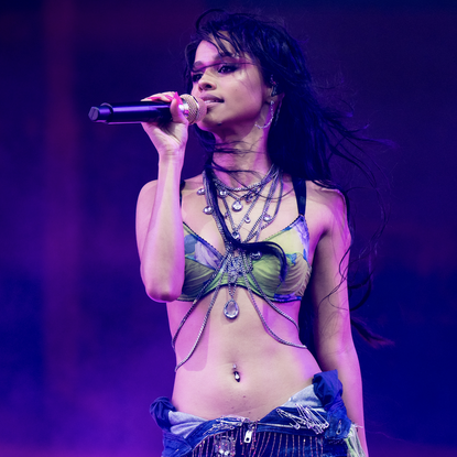 Tyla performs during the 2025 Coachella Valley Music And Arts Festival Weekend 2 - Day 1 on April 18, 2025 in Indio, California in a bra and fringe shorts