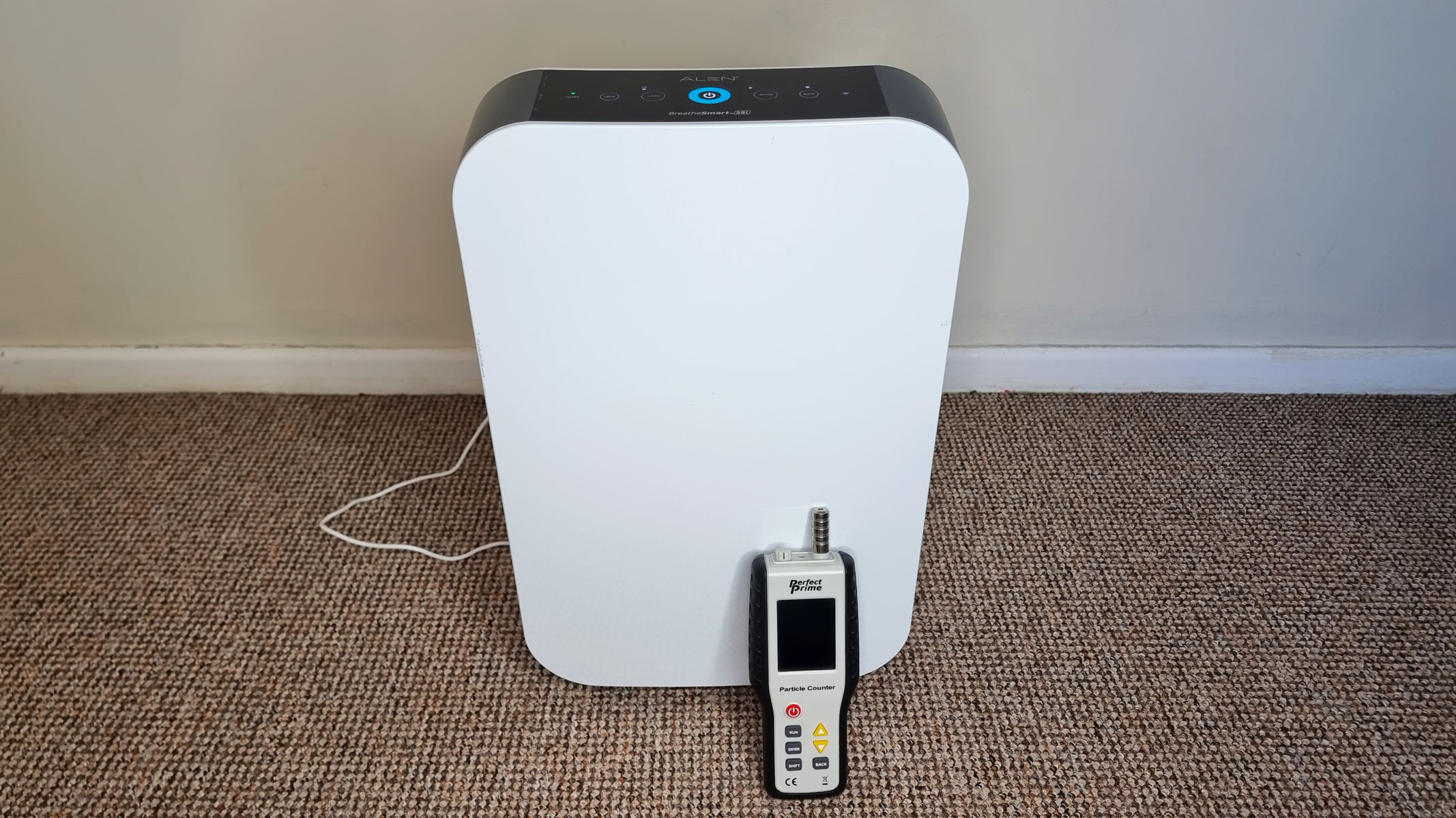 picture of the Alen BreatheSmart 35i air purifier and the Perfect Prime air particle counter