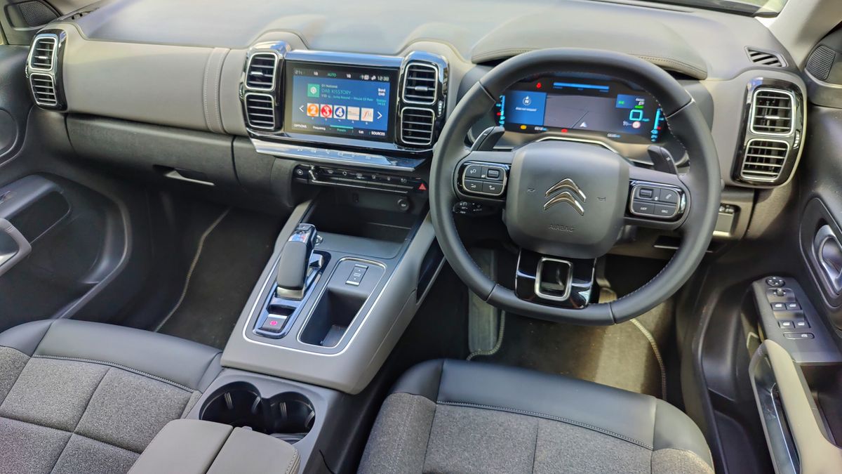 Interior shot of Citro&euml;n C5 AirCross showing infotainment and steering wheel