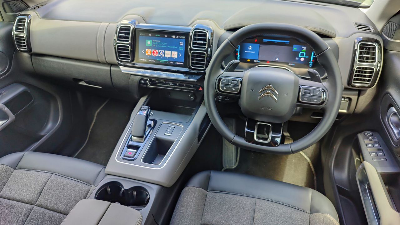Interior shot of Citro&euml;n C5 AirCross showing infotainment and steering wheel