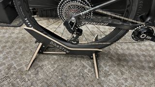 Bike Stow Stance on a workshop floor