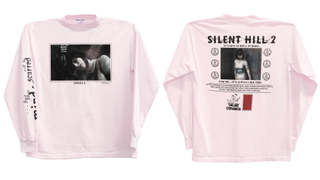 A pink, long-sleeved t-shirt, featuring a picture from Silent Hill 2 and the quote "AFTER RECEMVING A LETTER MEET HER IN THE FROMHIS WIFE MARYAMES SINDERLAND TAKES A tOIDY TOWN WHERE THEY SOENT THEIR HONEYMOON SILENT HILL THE ONLY DIFFERENCE IS MARY DIED THREE YEARS AGO"