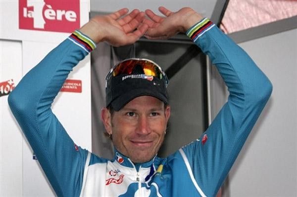 Laurent Brochard smiles as he steps onto the points classification podium