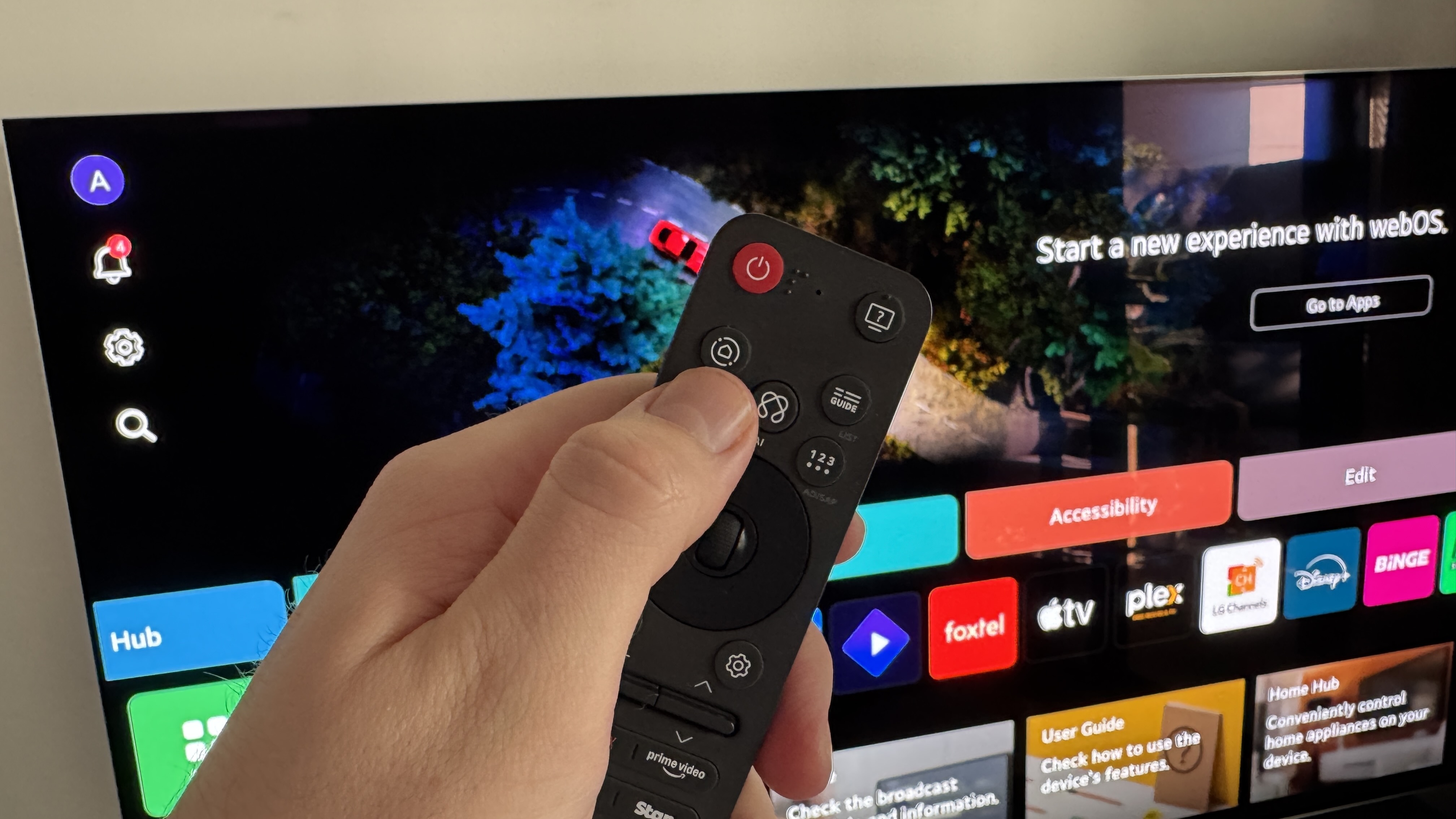 LG's new Magic Remote held in a hand.
