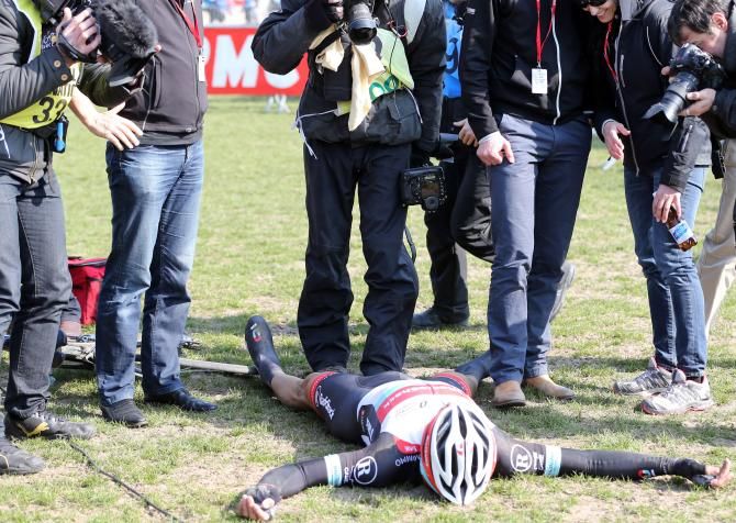 Fabian Cancellara collapses exhausted after Paris-Roubaix