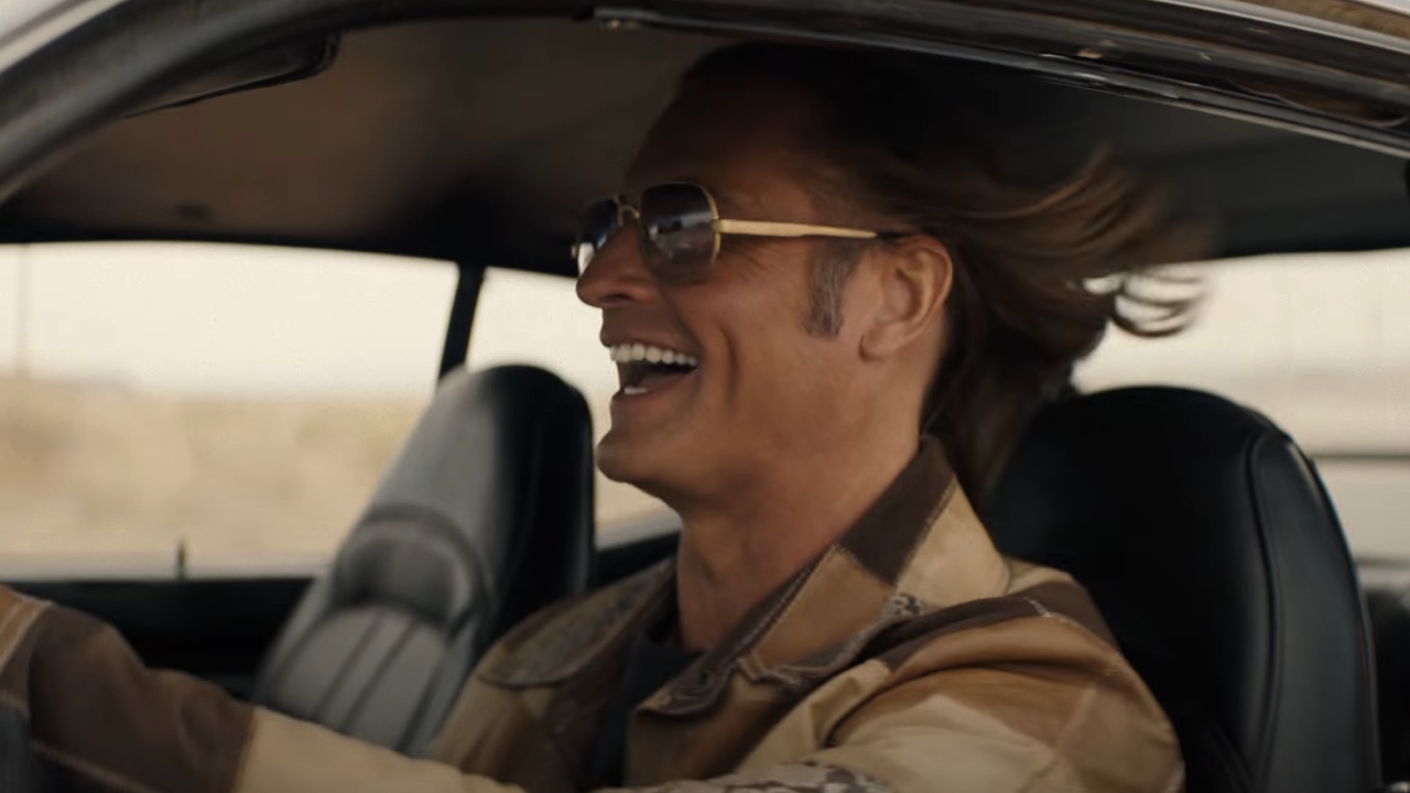 Josh Holloway driving a car in Duster