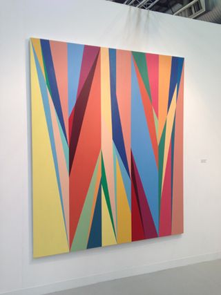 A large canvas with multi-coloured shapes.