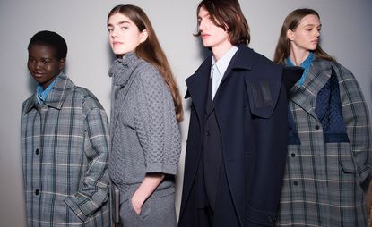 Stella McCartney A/W 2018 backstage, grey and navy oversized coats with shirts underneath
