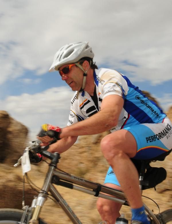 A Performance Bicycle racer threads his way through a rock garden